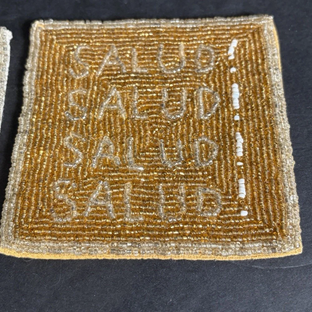 Kim Seybert Coasters Beaded Salud & Chin Chin Cheers Set of 2 Glass Beads NYC